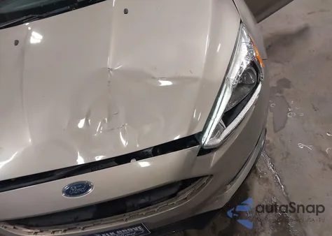 2015 Ford Focus Titanium from USA, damaged, VIN 1FADP3N27FL328473